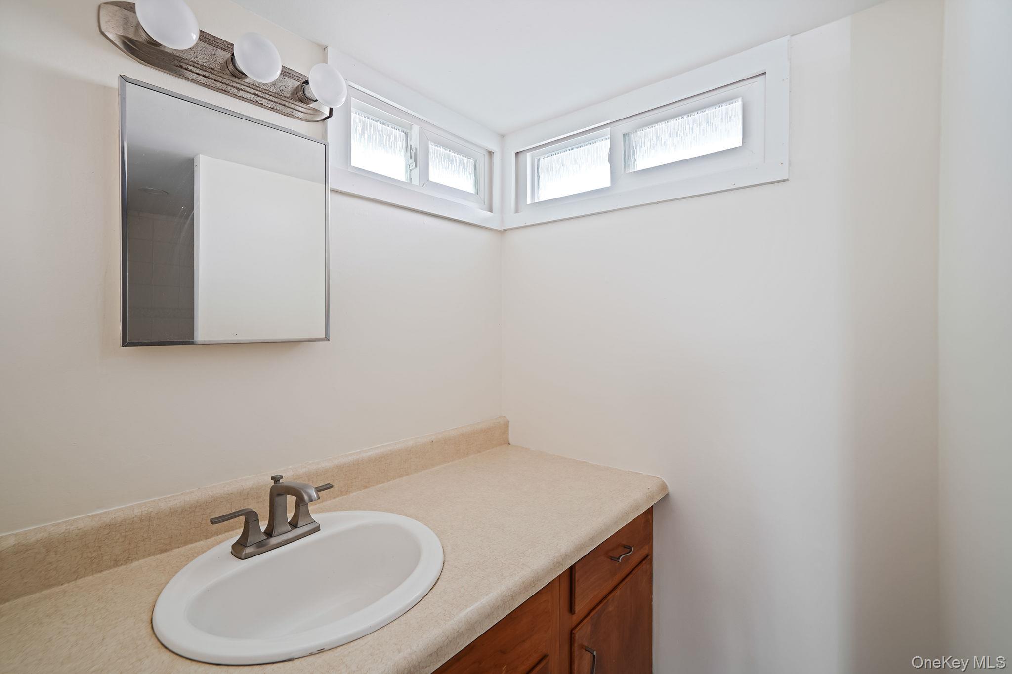 65 Woodlawn Road Rocky Point, NY 11778 - Photo 13 of 25
