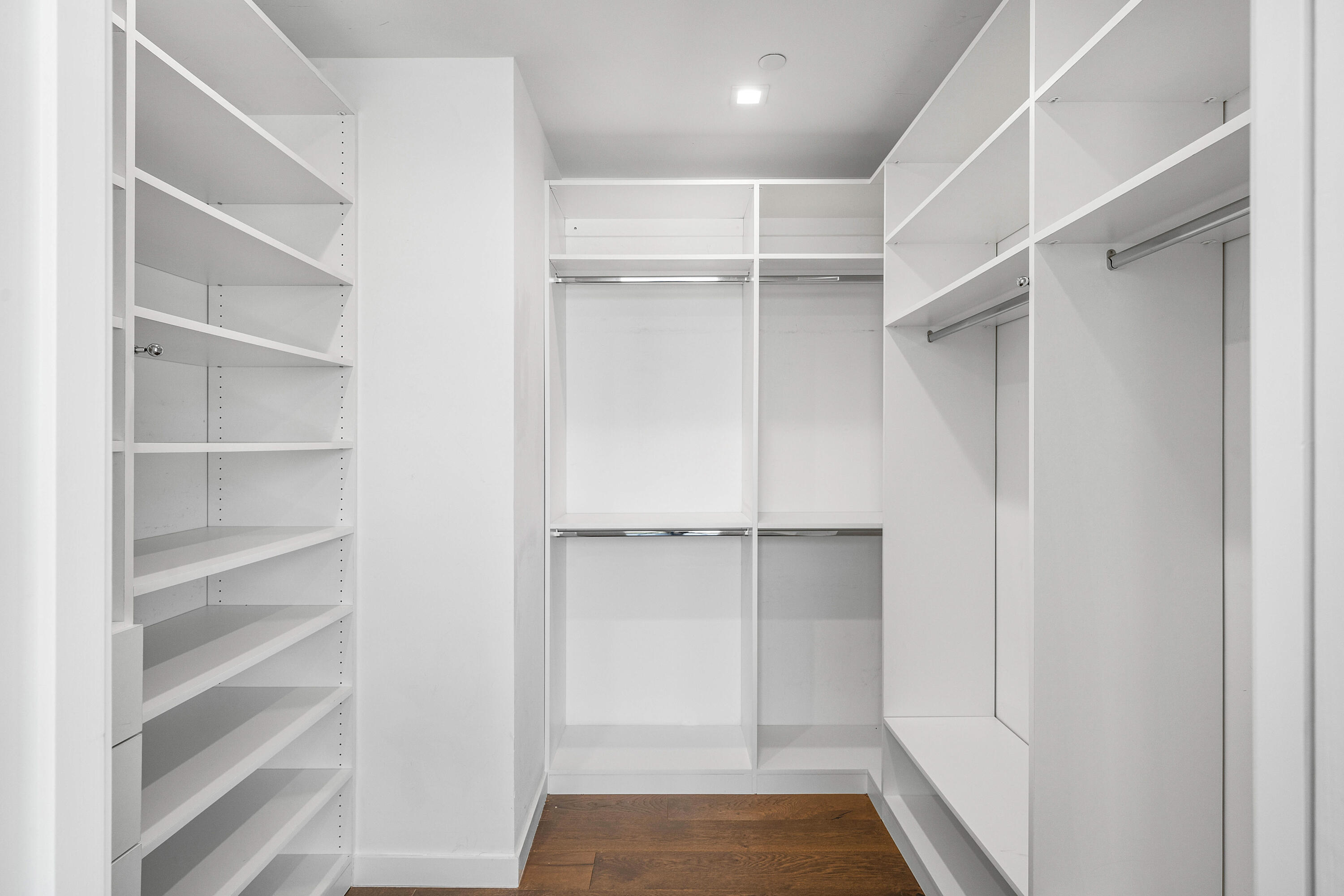 11505 Old Ocean Boulevard Ocean Ridge, FL 33435 - Photo 18 of 35 a view of walk in closet with empty racks