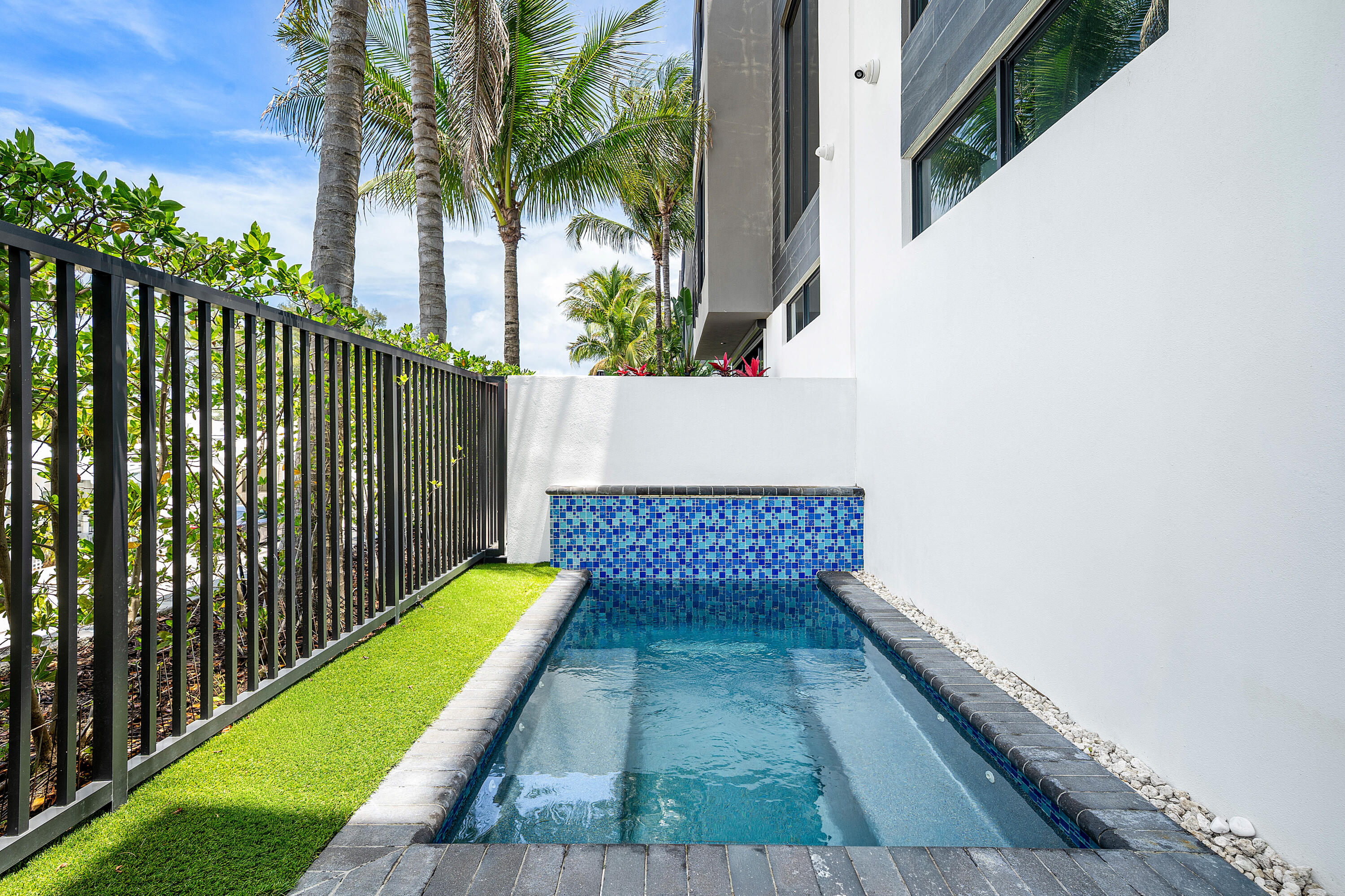 11505 Old Ocean Boulevard Ocean Ridge, FL 33435 - Photo 26 of 35 a view of balcony with wooden floor and fence