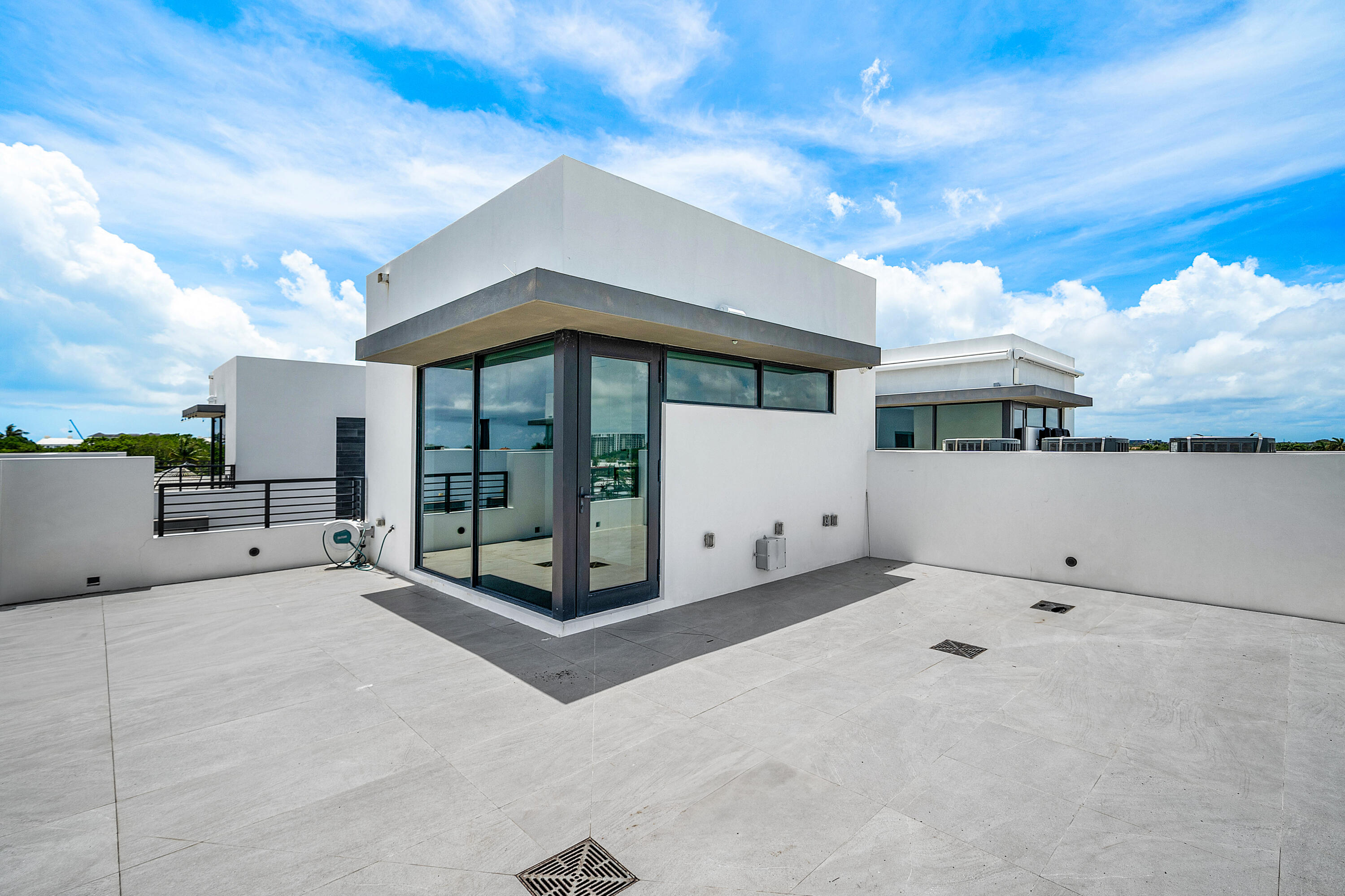11505 Old Ocean Boulevard Ocean Ridge, FL 33435 - Photo 33 of 35 a view of a terrace with a barbeque