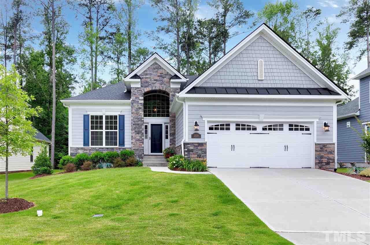 2519 Range Overlook Crossing Apex, NC 27523 - Photo 1 of 26 a front view of a house with a yard