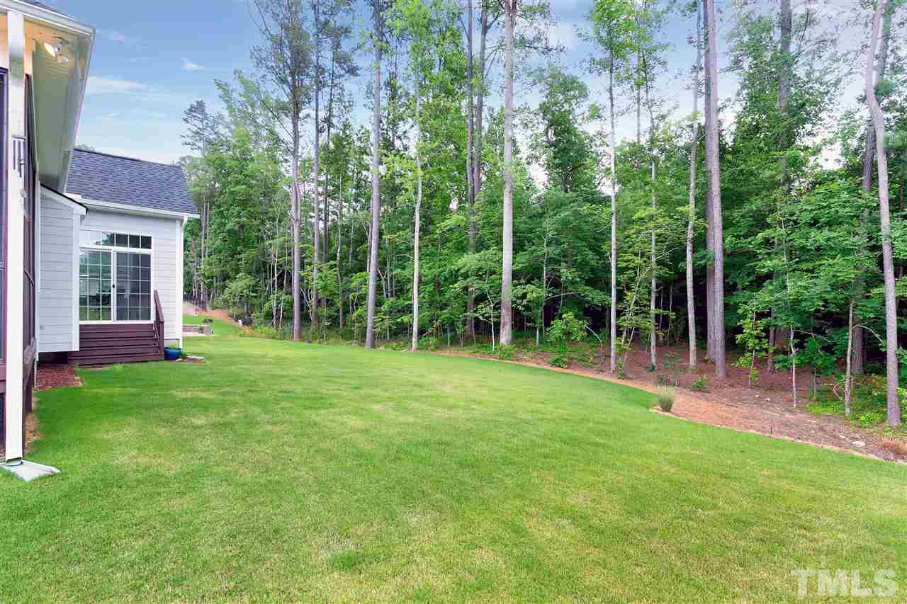 2519 Range Overlook Crossing Apex, NC 27523 - Photo 23 of 26 a view of a house with backyard