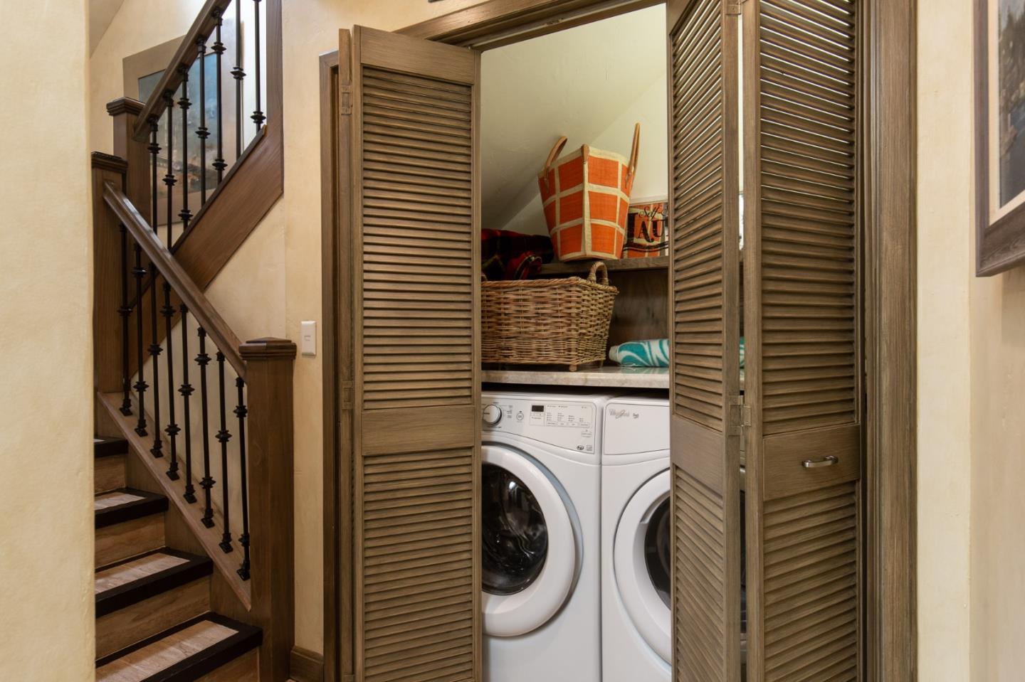 0 Southwest Sw Corner, Unit F Carmel, CA 93921 - Photo 13 of 19 a view of a hallway with washer and dryer