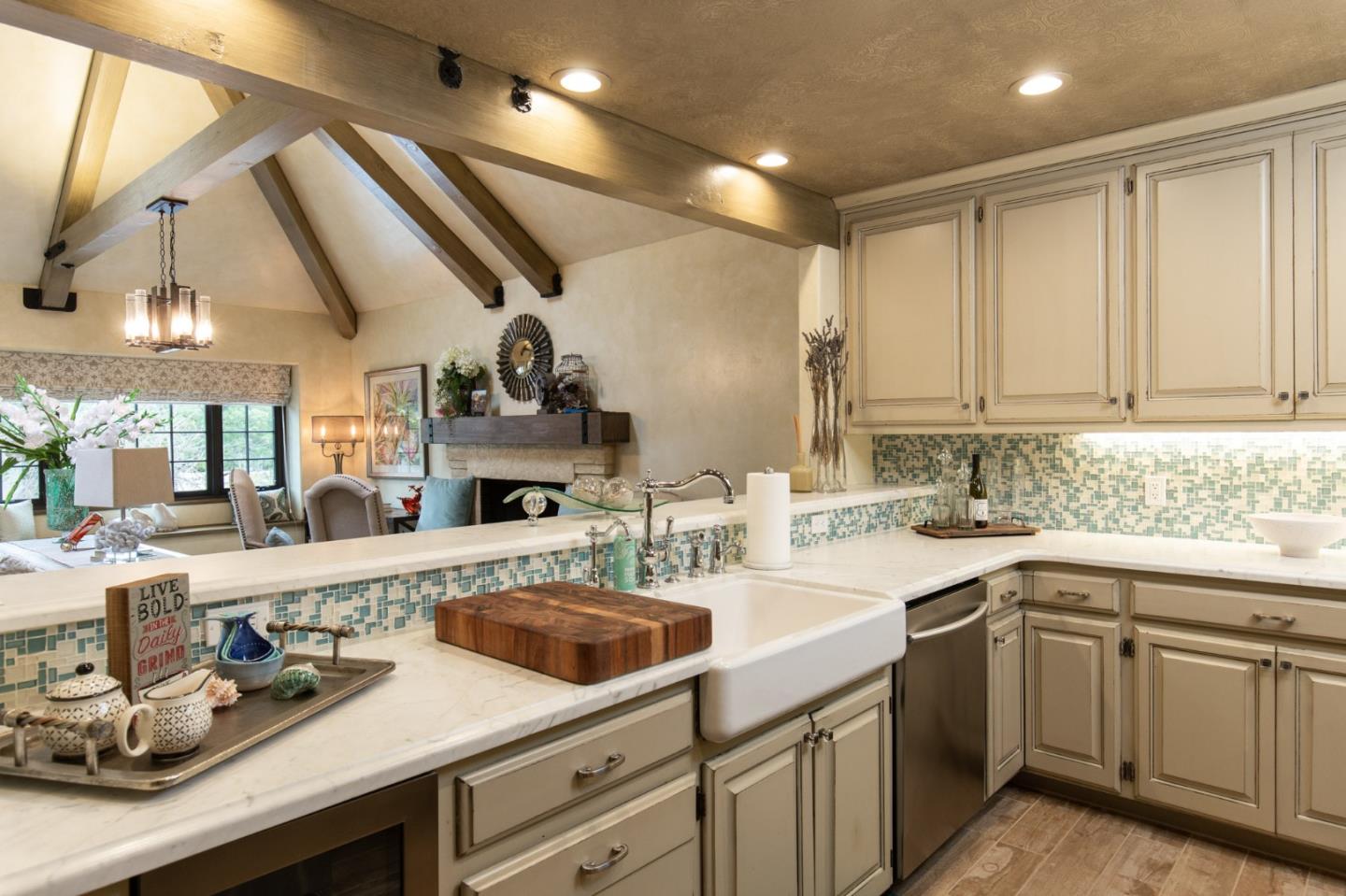 0 Southwest Sw Corner, Unit F Carmel, CA 93921 - Photo 10 of 19 a kitchen with cabinets appliances and a sink