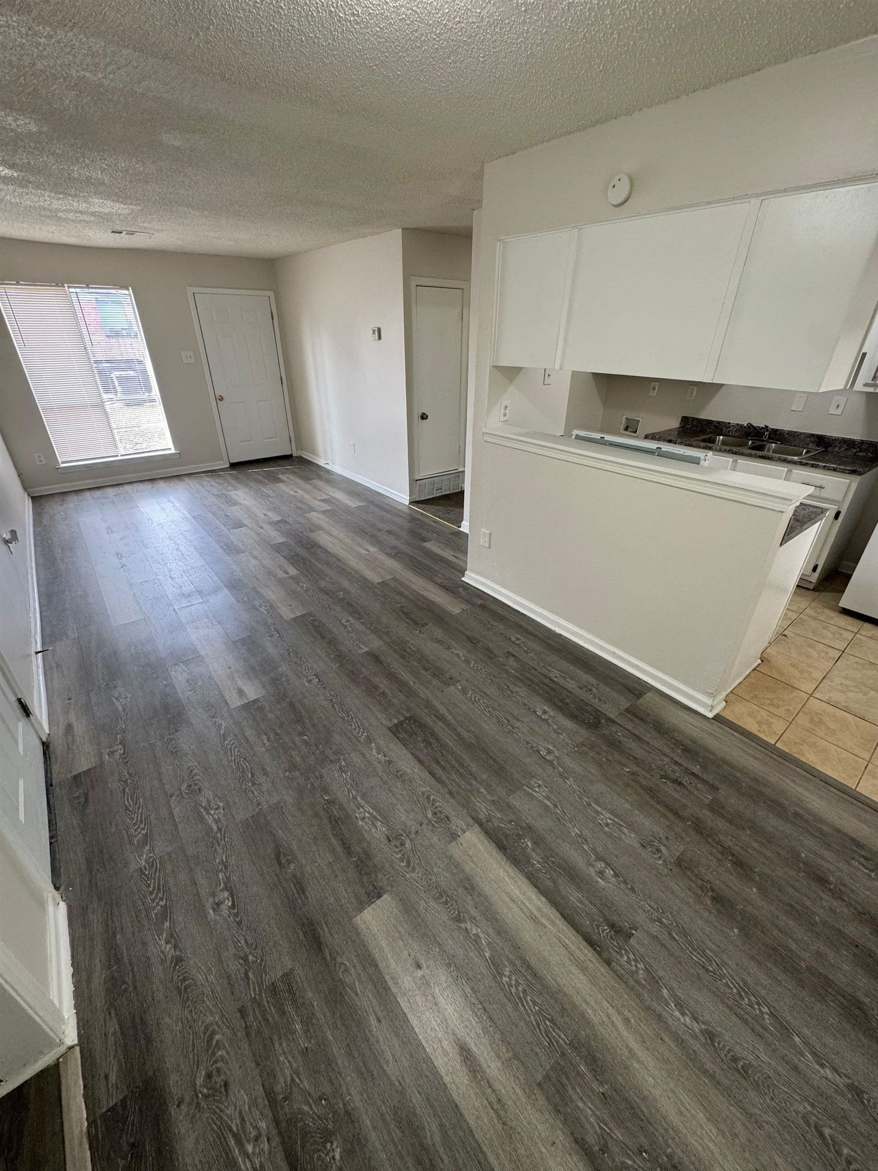 4528 Sugar Creek Road Memphis, TN 38118 - Photo 11 of 19 a view of a kitchen with wooden floor