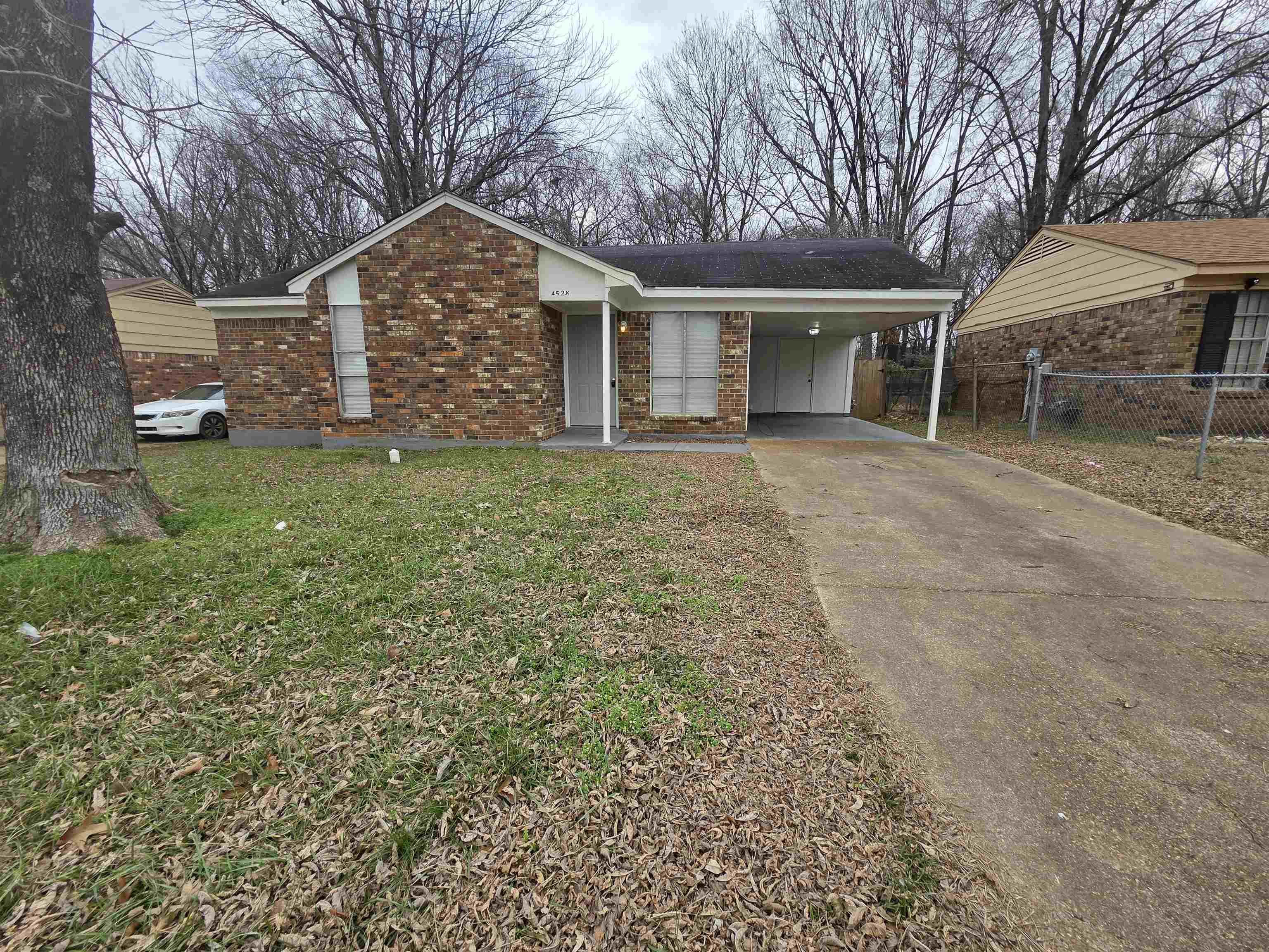 4528 Sugar Creek Road Memphis, TN 38118 - Photo 20 of 40 front view of a house with a yard
