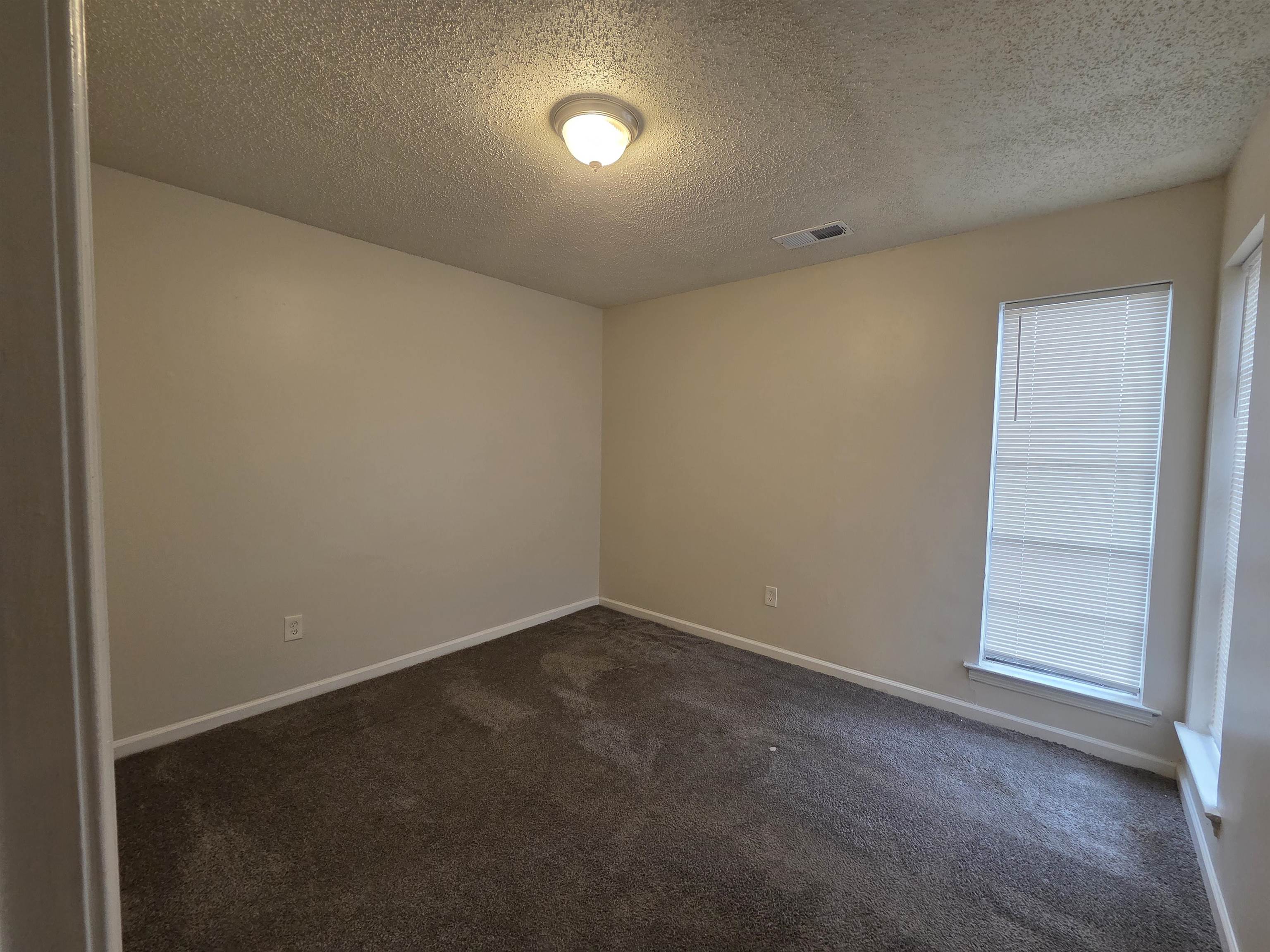 4528 Sugar Creek Road Memphis, TN 38118 - Photo 22 of 40 an empty room with a empty space