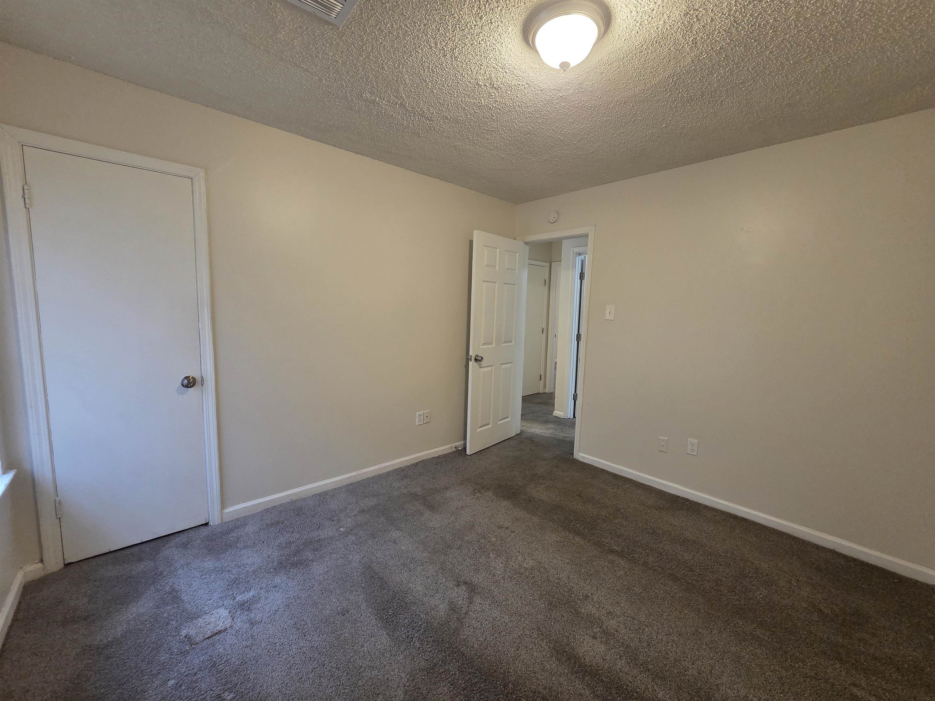 4528 Sugar Creek Road Memphis, TN 38118 - Photo 23 of 40 an empty room with an entryway