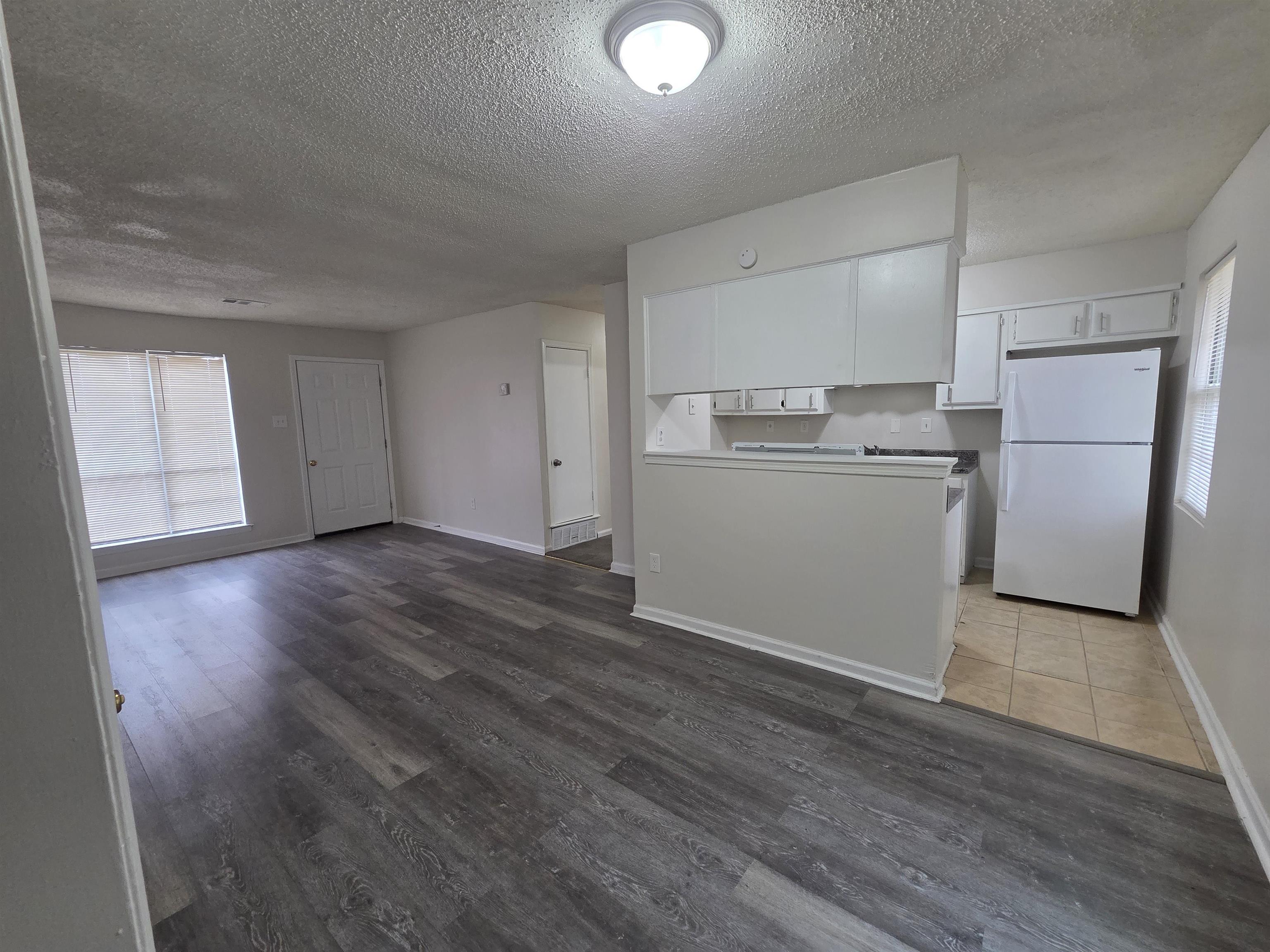4528 Sugar Creek Road Memphis, TN 38118 - Photo 40 of 40 a view of a kitchen with a sink and a refrigerator