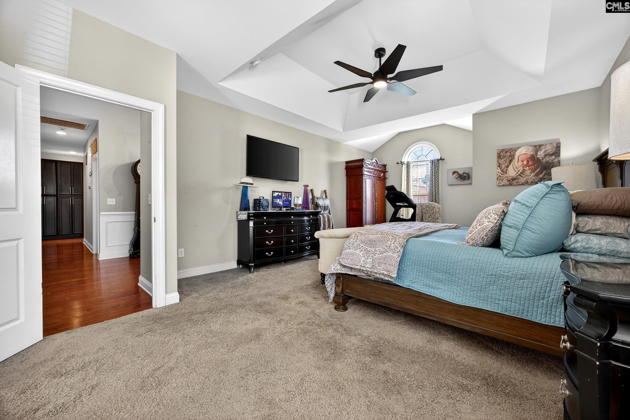 116 Renard Way Gilbert, SC 29054 - Photo 34 of 74 a bed room with a bed and a television