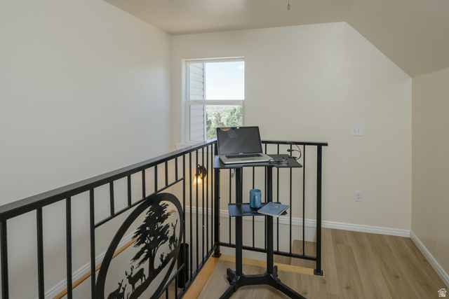 684 Blue Mountain Ridge Monticello, UT 84535 - Photo 47 of 71 Stairs with wood finished floors and baseboards