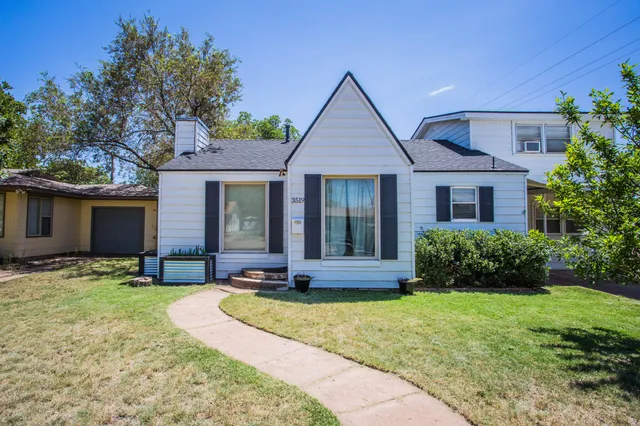 a view of a livingroom with wooden floor