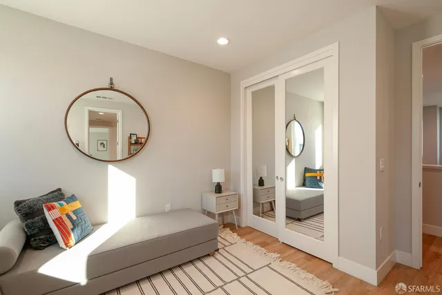a bathroom with a glass shower door
