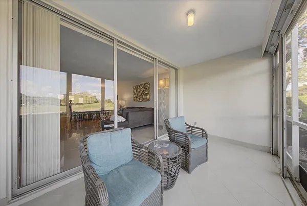 a outdoor living space with furniture and a window