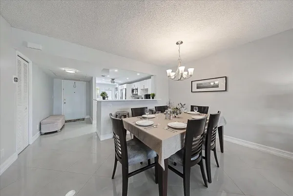 a view of a dining room with furniture