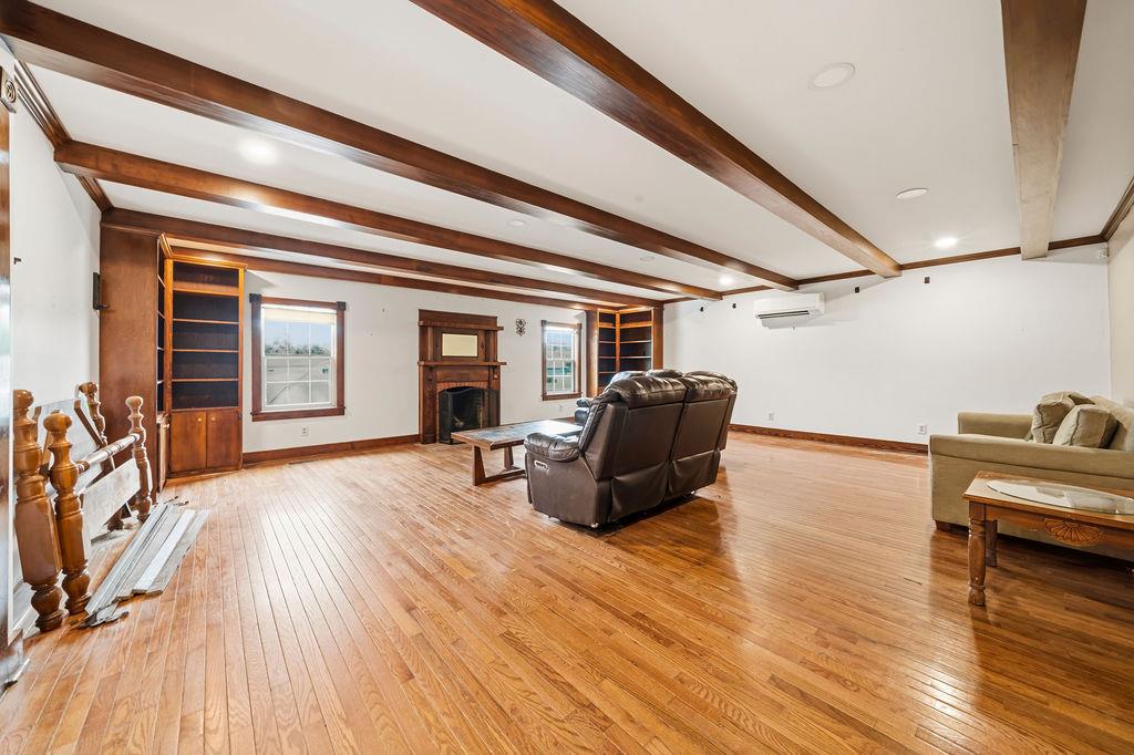 483 Allgood Road Flintstone, GA 30725 - Photo 21 of 34 a living room with furniture and a wooden floor