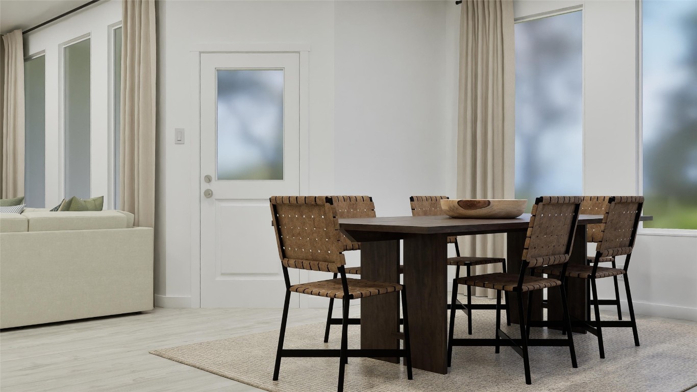 2206 Jeter Drive Bryan, TX 77807 - Photo 12 of 26 a view of a dining room with furniture and a window