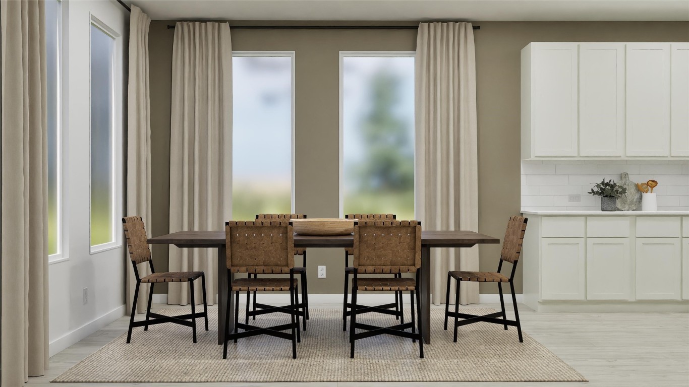 2206 Jeter Drive Bryan, TX 77807 - Photo 13 of 26 a view of a dining room with furniture and window
