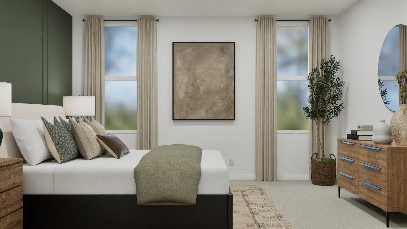 2206 Jeter Drive Bryan, TX 77807 - Photo 17 of 26 a bedroom with a bed and a potted plant