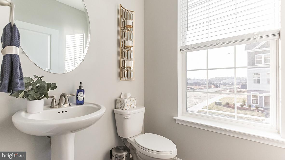35 Sisters Farmstead Road Mount Laurel, NJ 08054 - Photo 12 of 31 a bathroom with a sink a toilet and a mirror