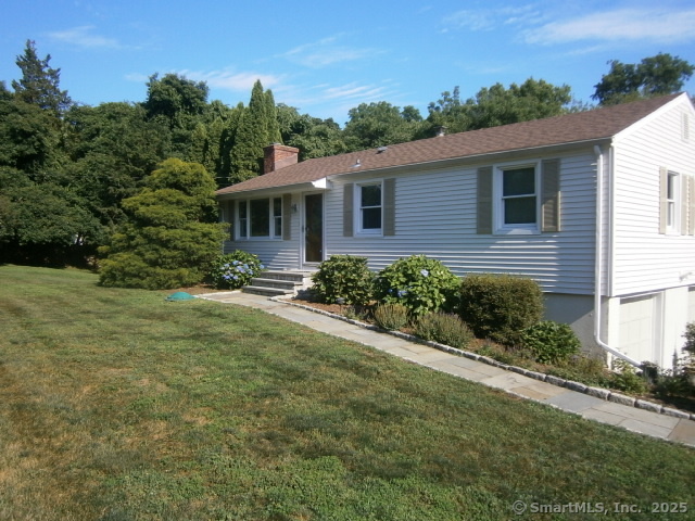 18 Hales Road Westport, CT 06880 - Photo 1 of 26 a view of a house with a garden