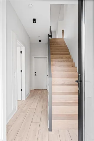 a view of a hallway with closet