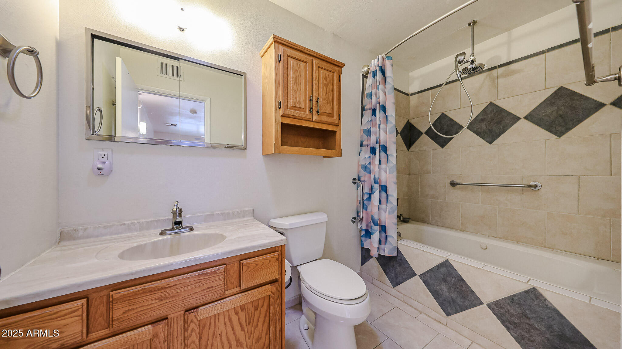 11851 North Thunderbird Road Sun City, AZ 85351 - Photo 25 of 46 a bathroom with a sink toilet and shower