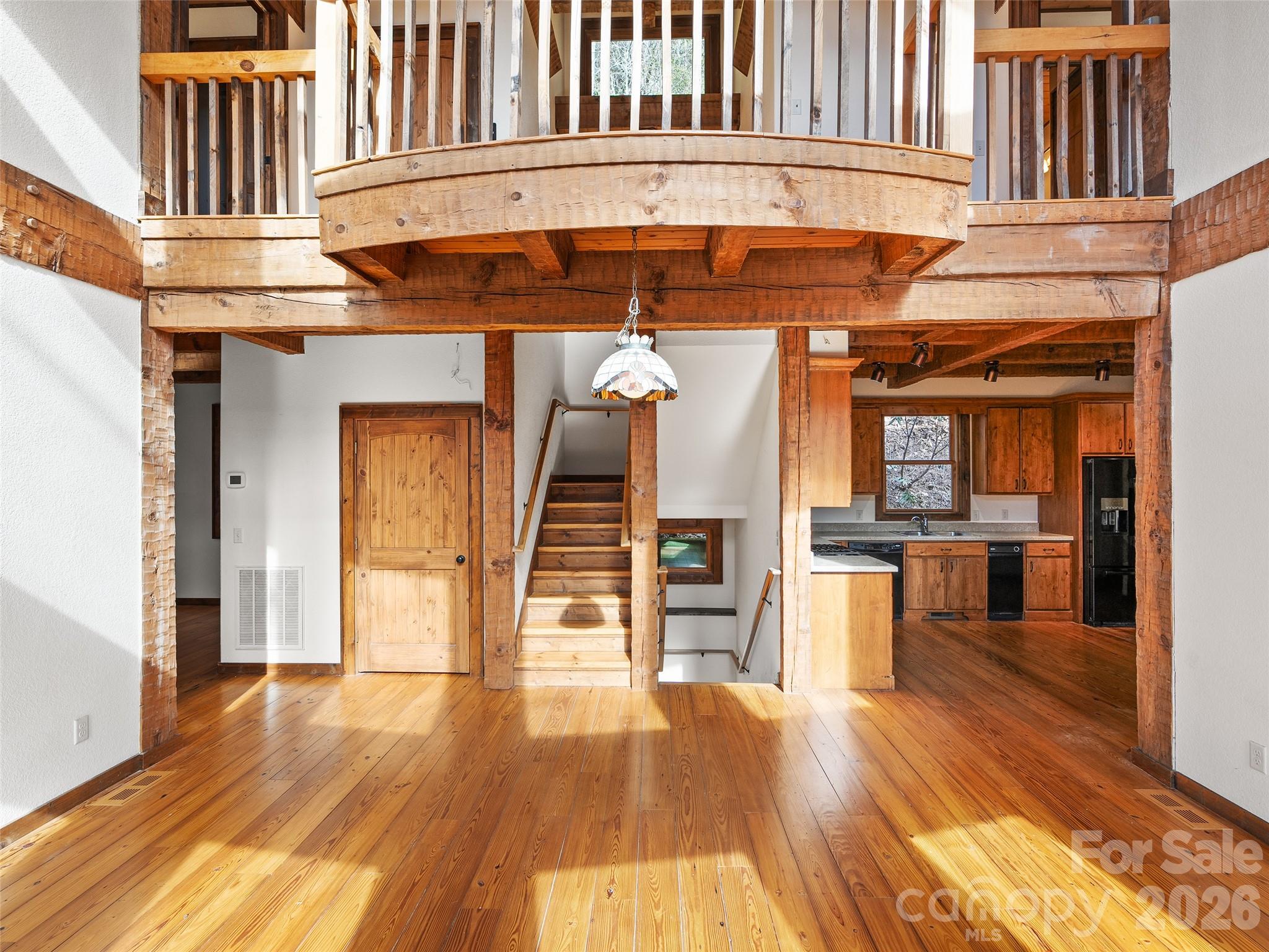 173 Heavenview Point Maggie Valley, NC 28751 - Photo 15 of 47 a view of a building with wooden floor and stairs
