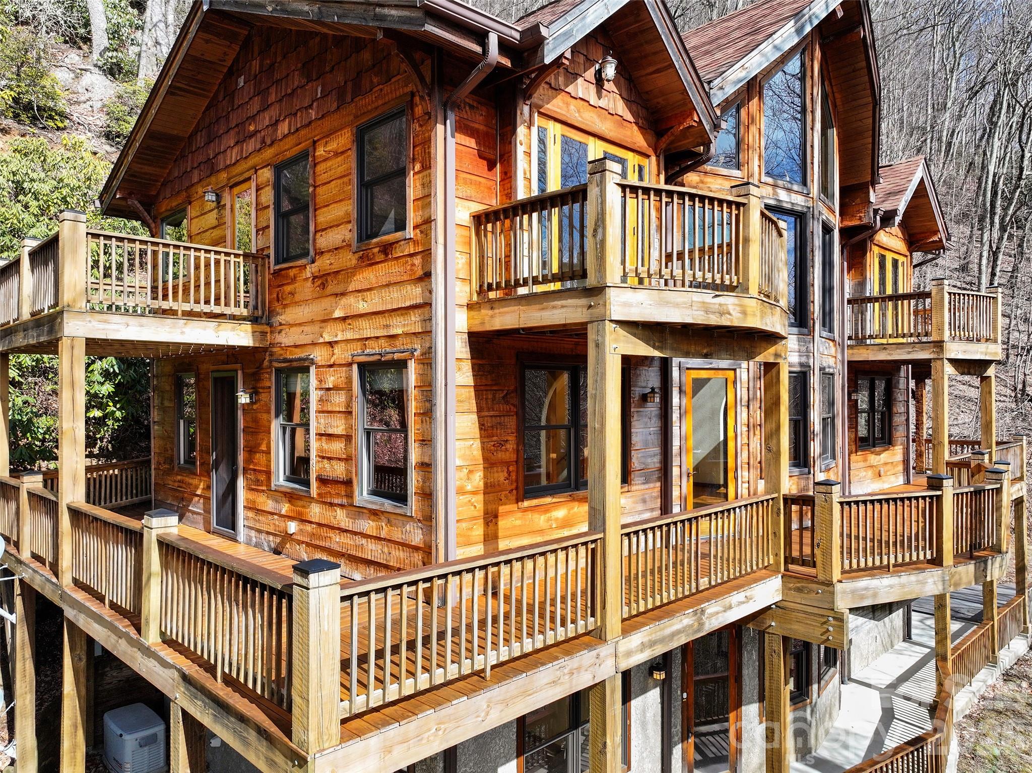 173 Heavenview Point Maggie Valley, NC 28751 - Photo 2 of 47 front view of a building with a window