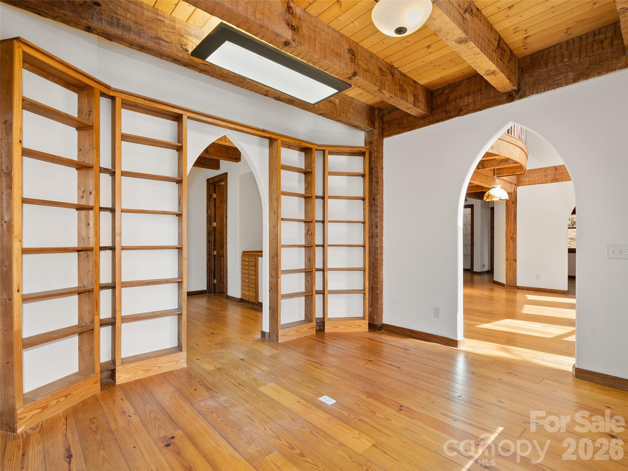 173 Heavenview Point Maggie Valley, NC 28751 - Photo 29 of 47 a view of empty room with wooden floor and fan