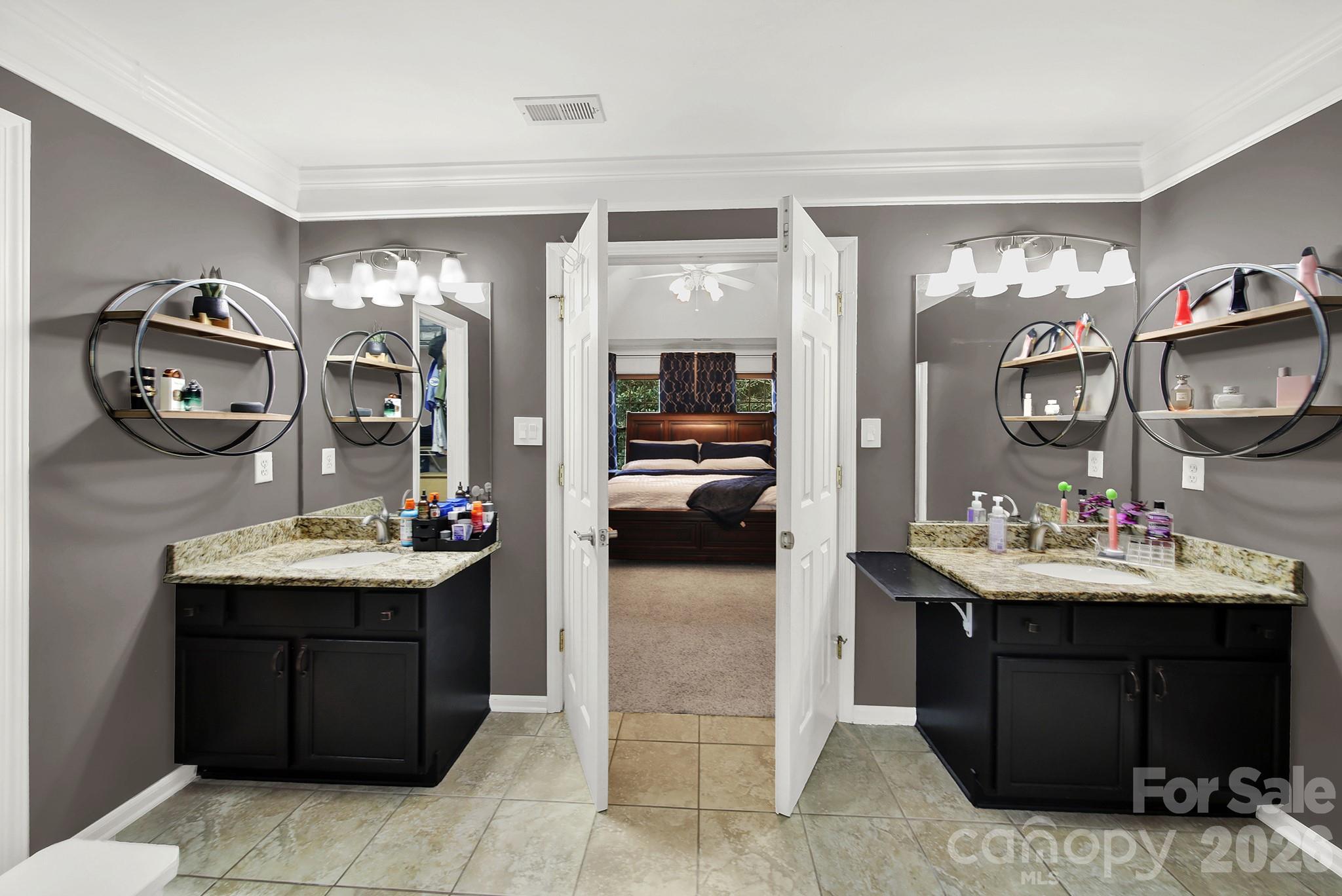 308 Patrick Avenue Southwest Concord, NC 28025 - Photo 18 of 26 a kitchen with a sink and cabinets