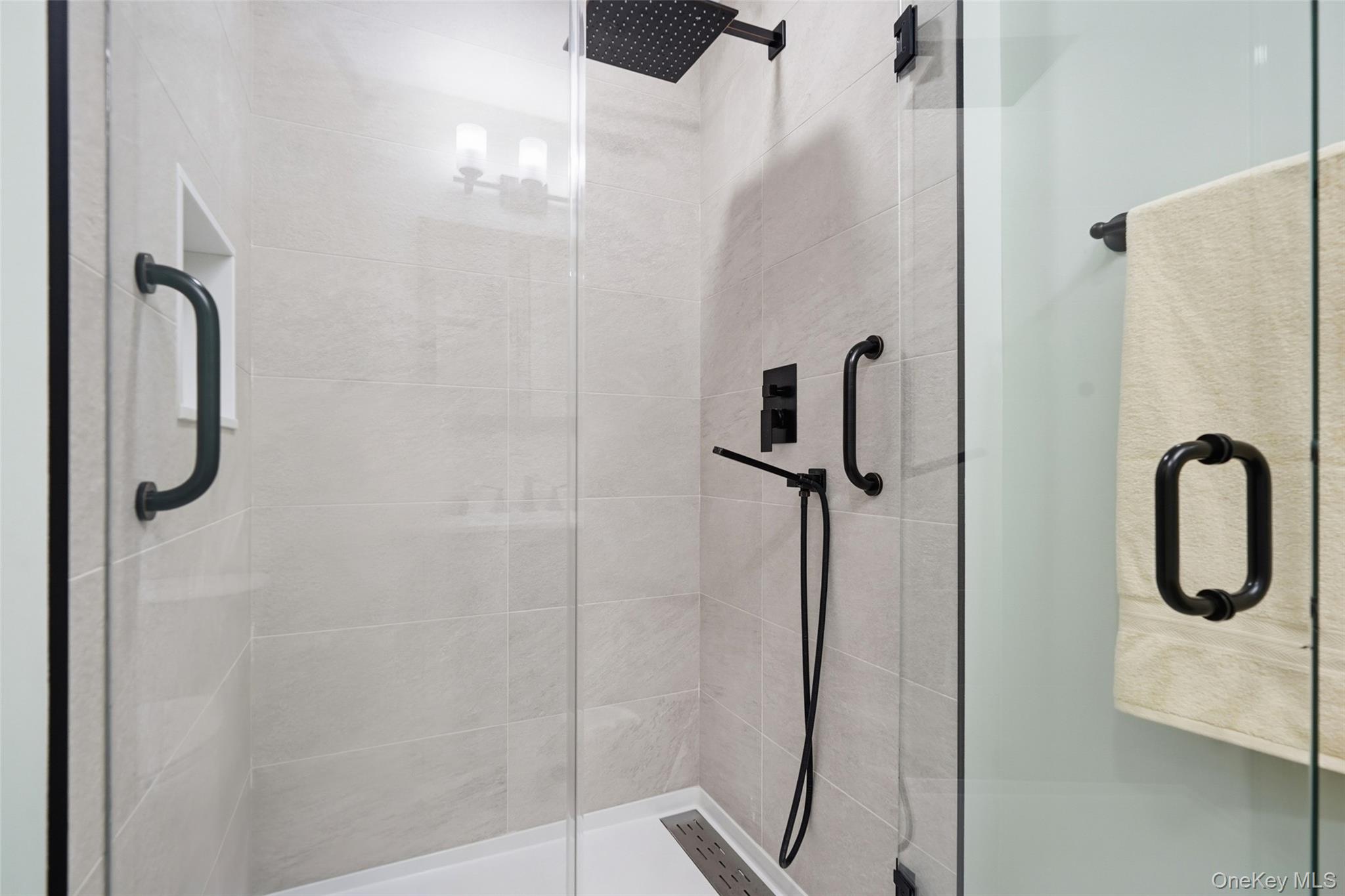 59 Brook Street Mahopac, NY 10541 - Photo 15 of 37 Nicely updated bathroom with walk in shower.