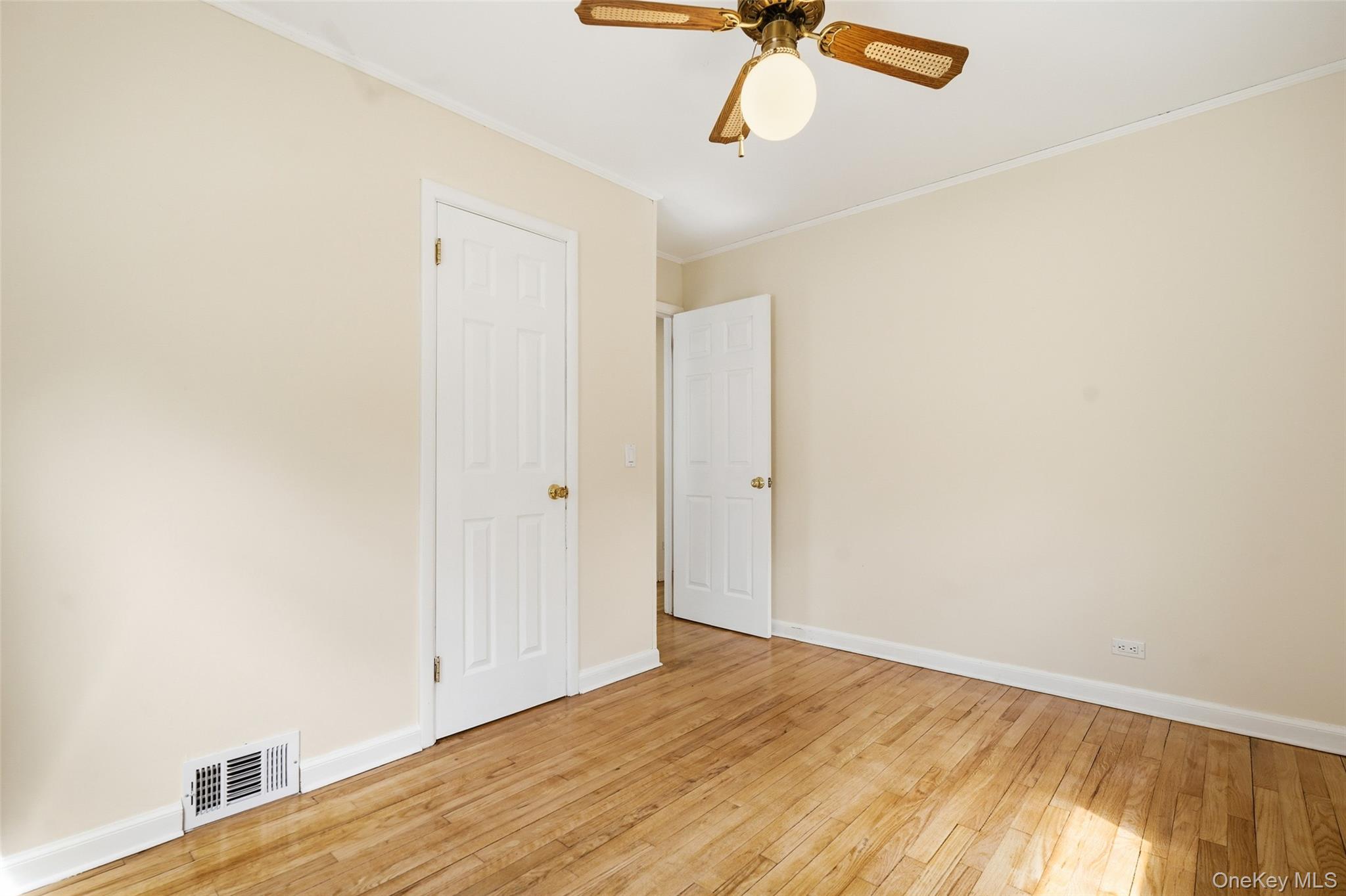 59 Brook Street Mahopac, NY 10541 - Photo 19 of 37 Bedroom #1 with closet and ceiling fan.