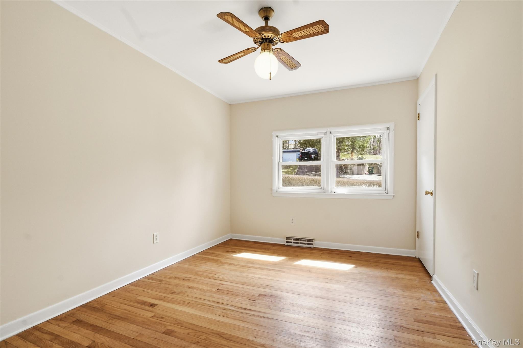 59 Brook Street Mahopac, NY 10541 - Photo 24 of 37 Bedroom #2 with hardwood floors and ceiling fan.