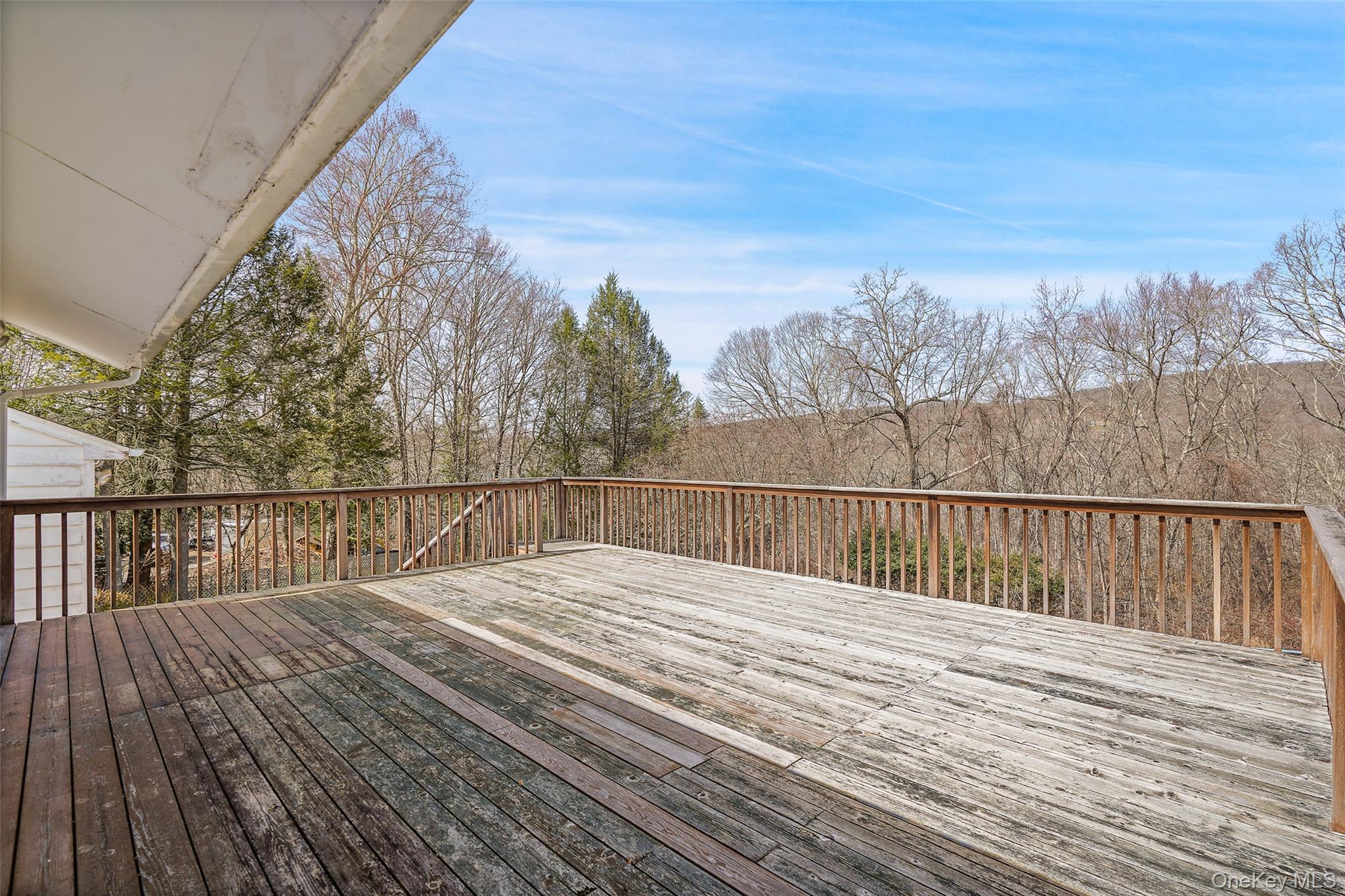 59 Brook Street Mahopac, NY 10541 - Photo 29 of 37 Expansive deck overlooking beautiful natural setting.