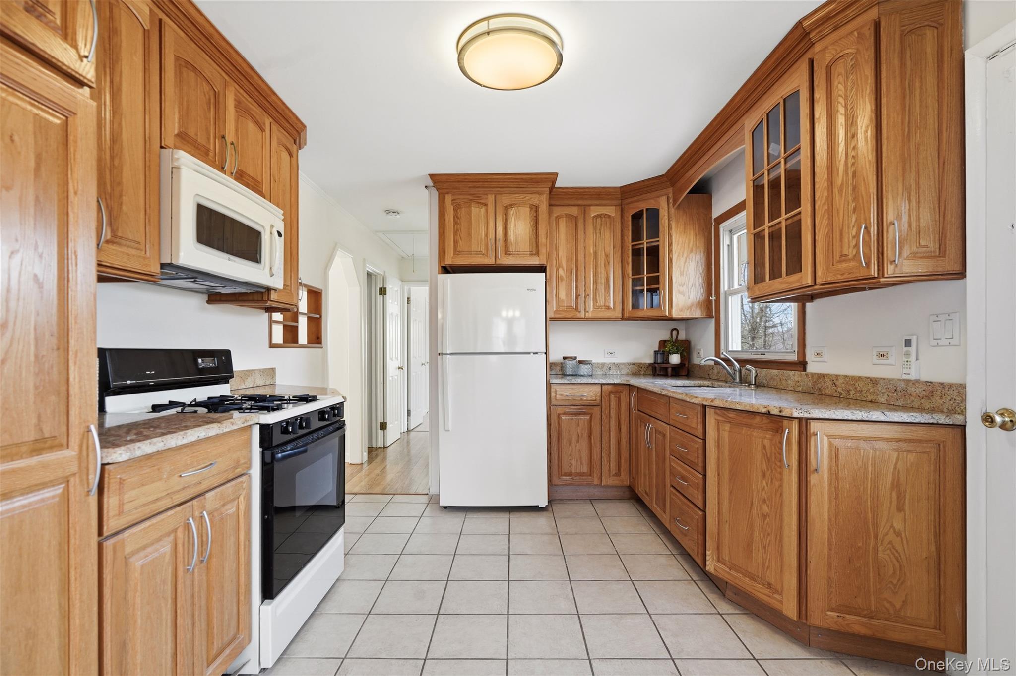 59 Brook Street Mahopac, NY 10541 - Photo 4 of 37 Nicely updated kitchen with gas stove and granite countertops.