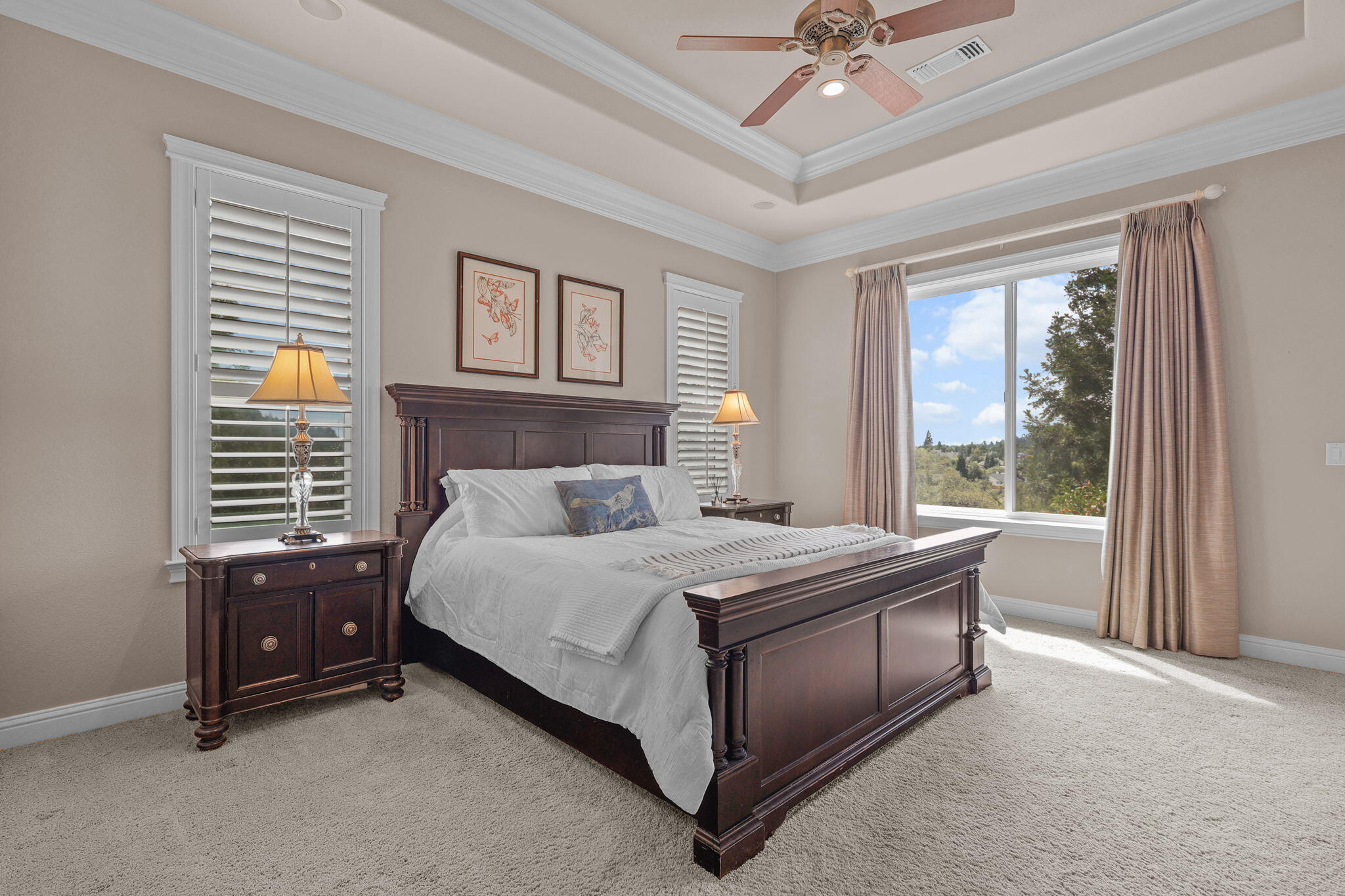 3582 Stone Ridge Place Redding, CA 96001 - Photo 11 of 34 a bed sitting in a spacious bedroom next to a window