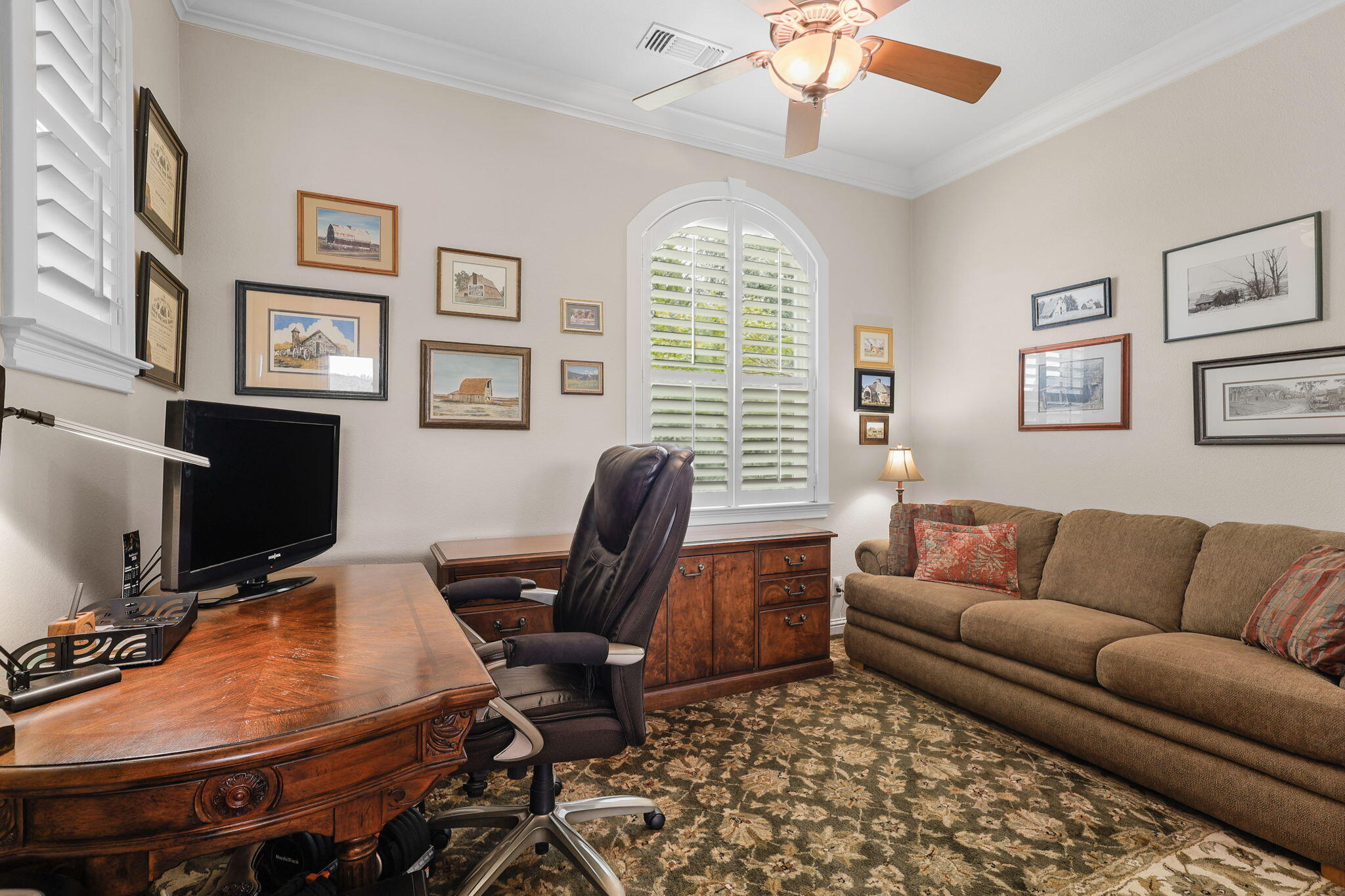 3582 Stone Ridge Place Redding, CA 96001 - Photo 15 of 34 a livingroom with workspace couch and a window