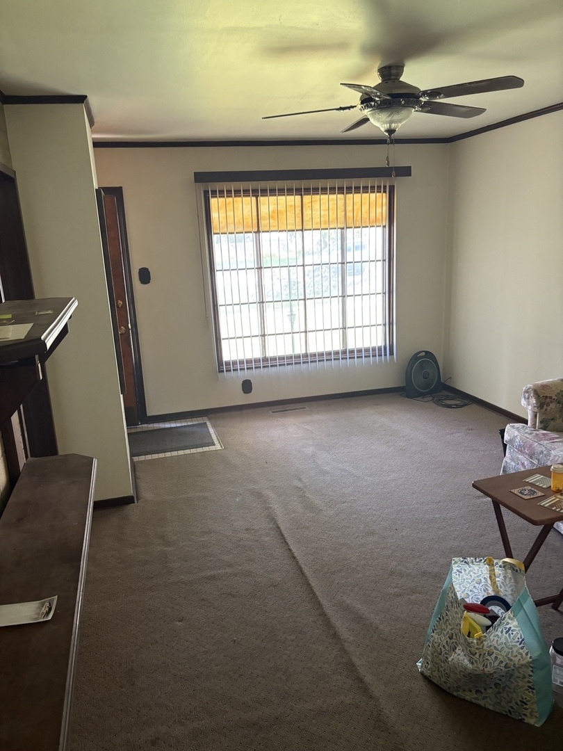 540 East 148th Place Harvey, IL 60426 - Photo 15 of 19 a view of livingroom with furniture and windows