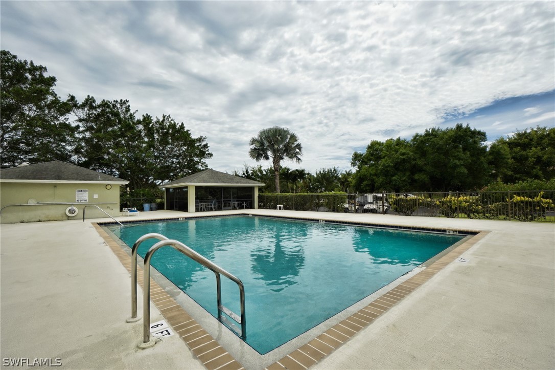 3011 Matecumbe Key Road, Unit 1 Punta Gorda, FL 33955 - Photo 13 of 14 a view of a swimming pool with a patio