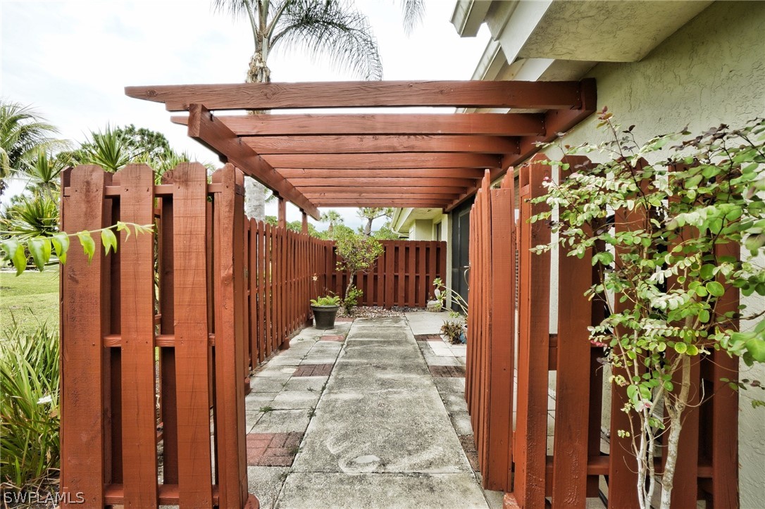 3011 Matecumbe Key Road, Unit 1 Punta Gorda, FL 33955 - Photo 2 of 14 a view of a patio with table and chairs