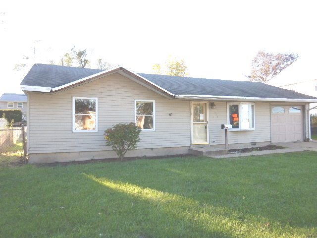 344 Hickory Avenue Romeoville, IL 60446 - Photo 1 of 11 a front view of a house with a garden and yard