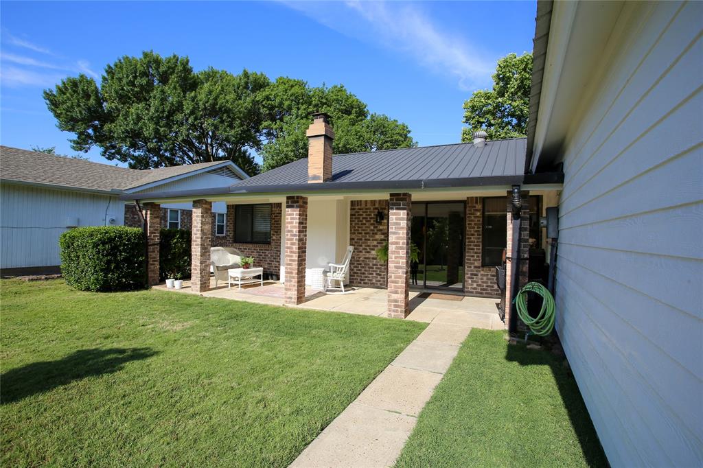 1720 Crystal Way Plano, TX 75074 - Photo 27 of 32 a view of a house with a garden