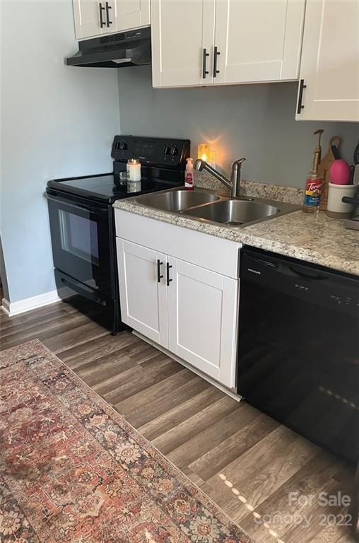 3797 Poplar Tent Road Concord, NC 28027 - Photo 11 of 15 a kitchen with a sink and cabinets