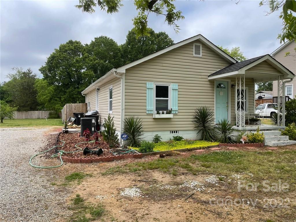 3797 Poplar Tent Road Concord, NC 28027 - Photo 3 of 15 a view of a house with backyard