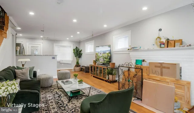 a living room with furniture and a table
