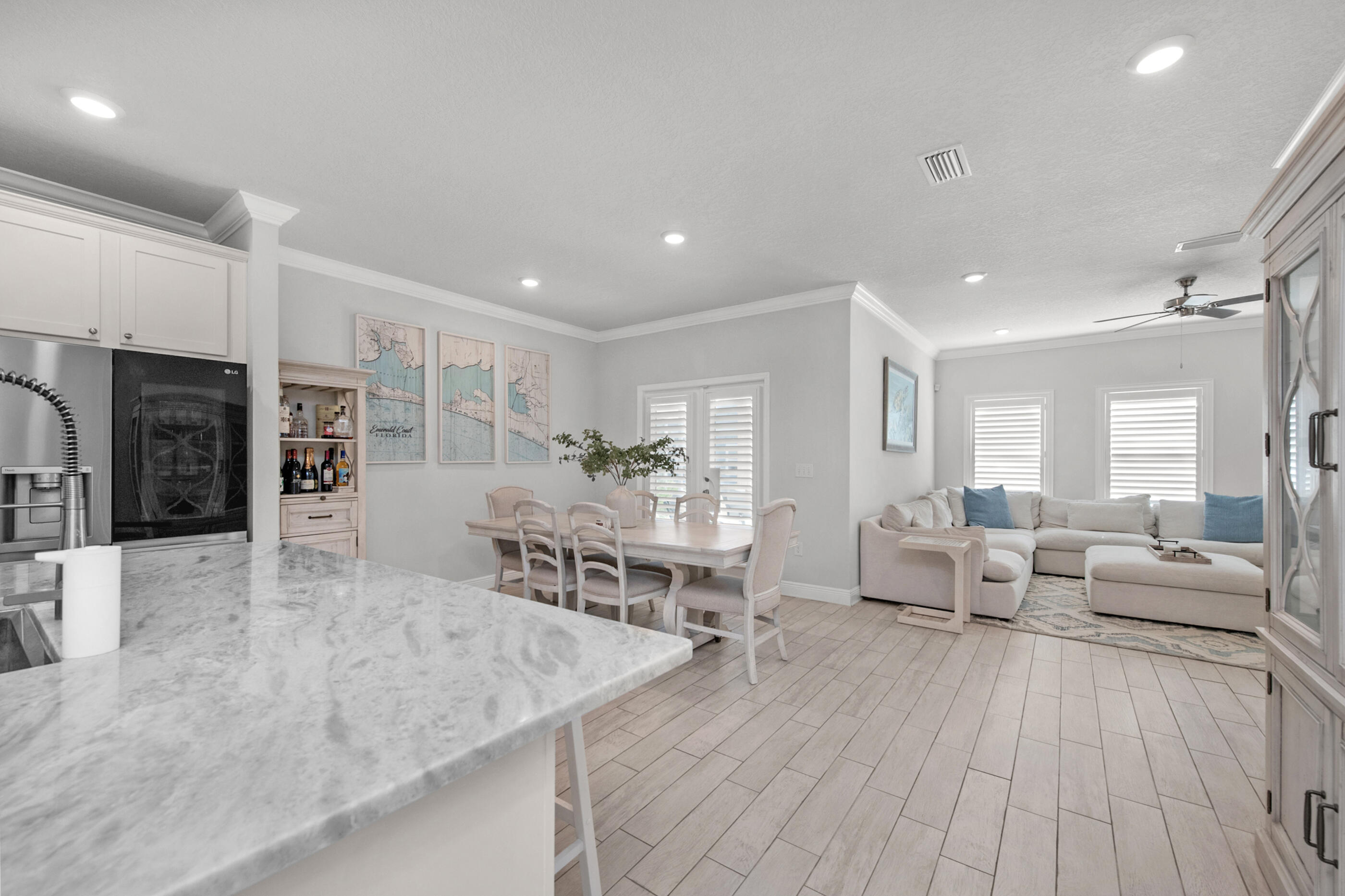 382 Lightning Bug Lane Freeport, FL 32439 - Photo 13 of 33 a view of a living room kitchen and a wooden floor
