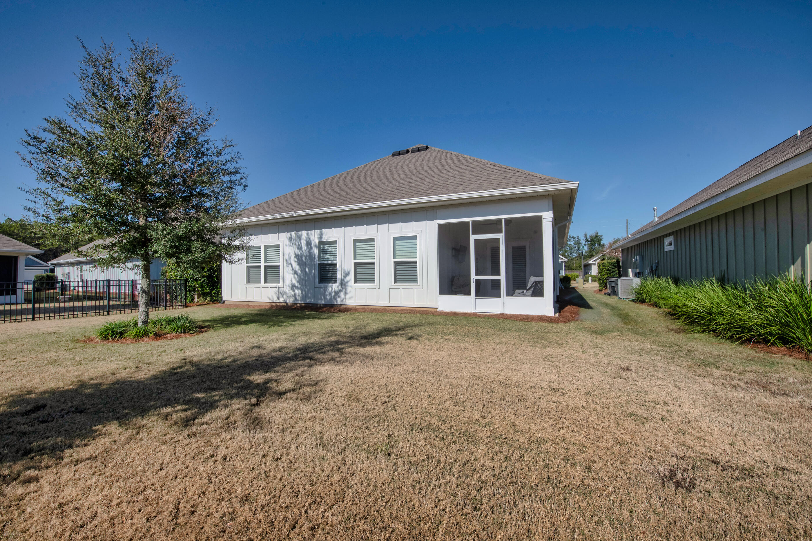 382 Lightning Bug Lane Freeport, FL 32439 - Photo 33 of 33 a view of a house with a yard