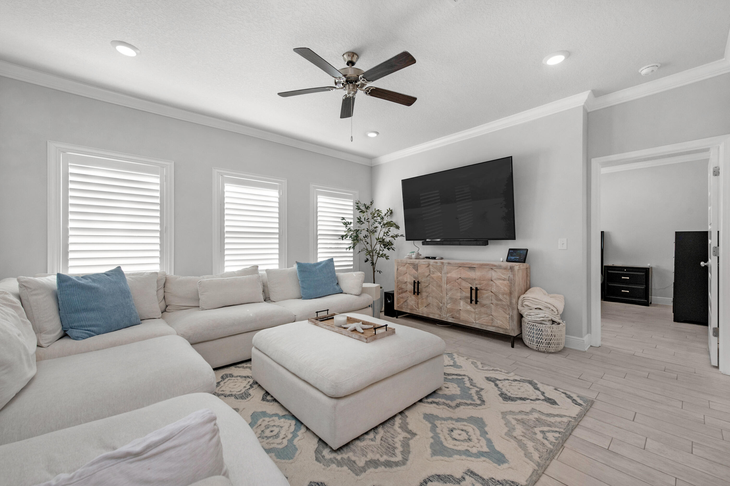 382 Lightning Bug Lane Freeport, FL 32439 - Photo 4 of 33 a living room with furniture and a flat screen tv