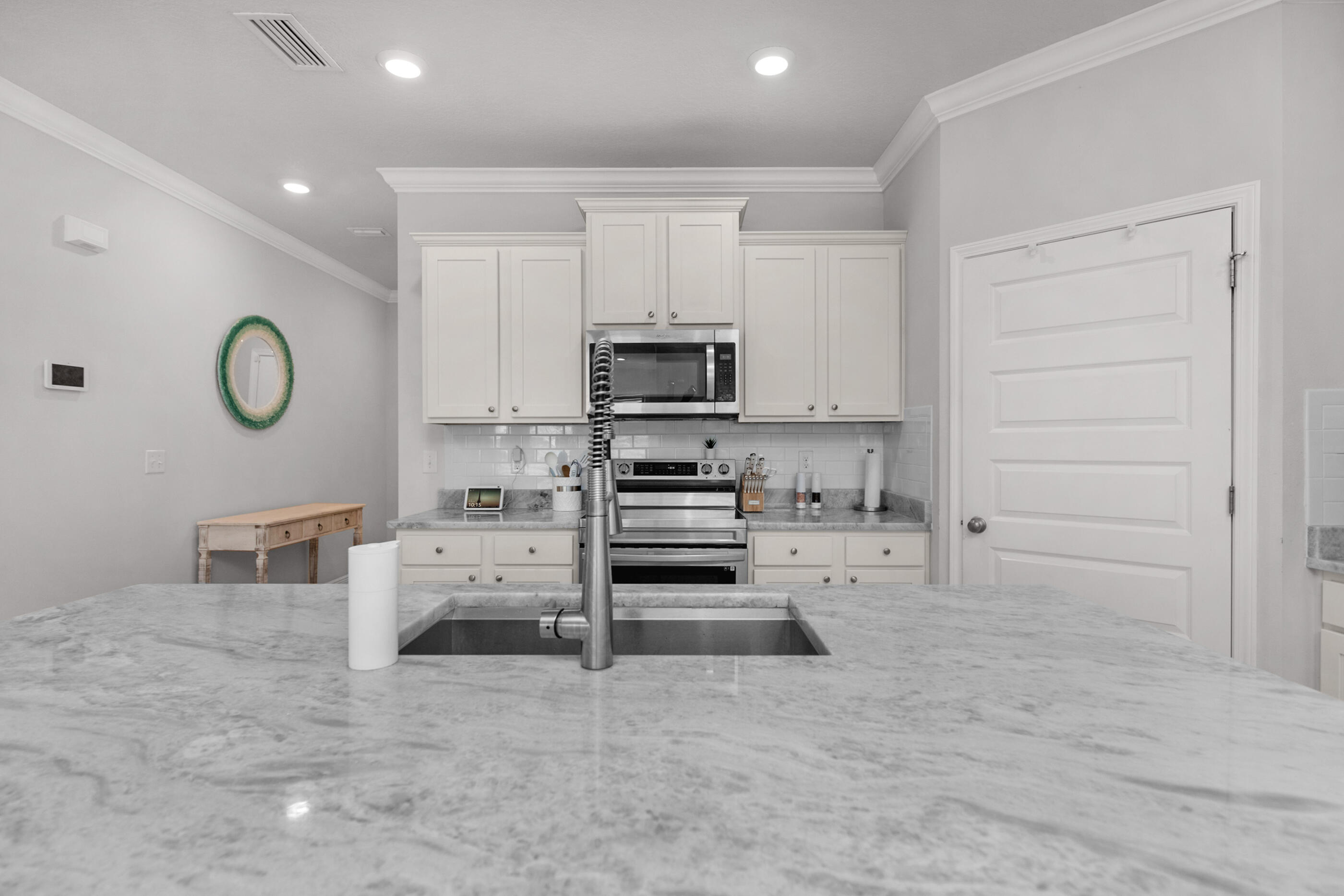 382 Lightning Bug Lane Freeport, FL 32439 - Photo 10 of 33 a view of kitchen with cabinets and oven